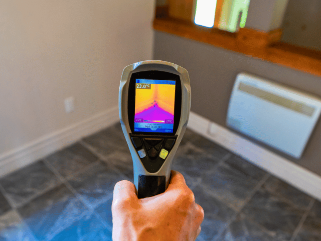 Testing device for measuring dampness in a house