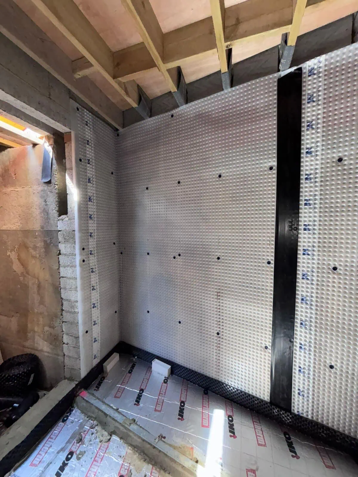 basement waterproofing type c Type C cavity drain membrane detailing to a basement corner in SW6