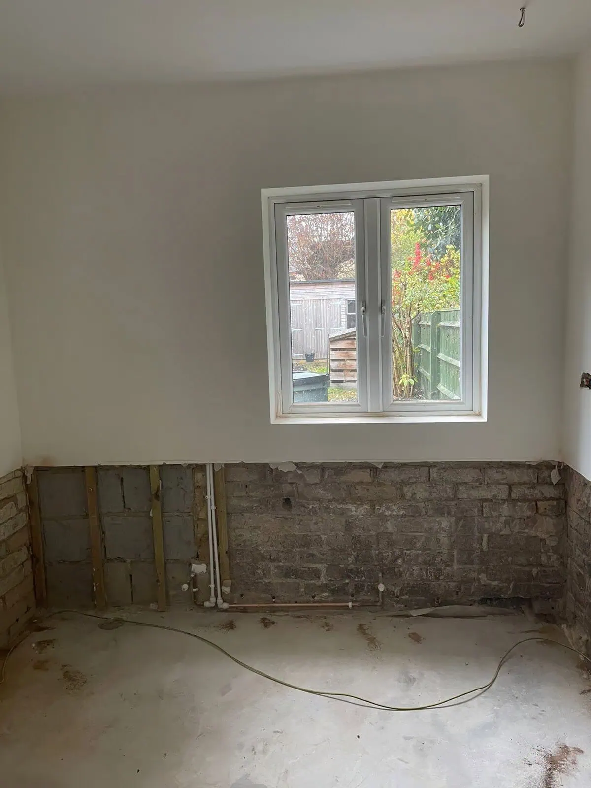 Wall prepared for damp proof course installation