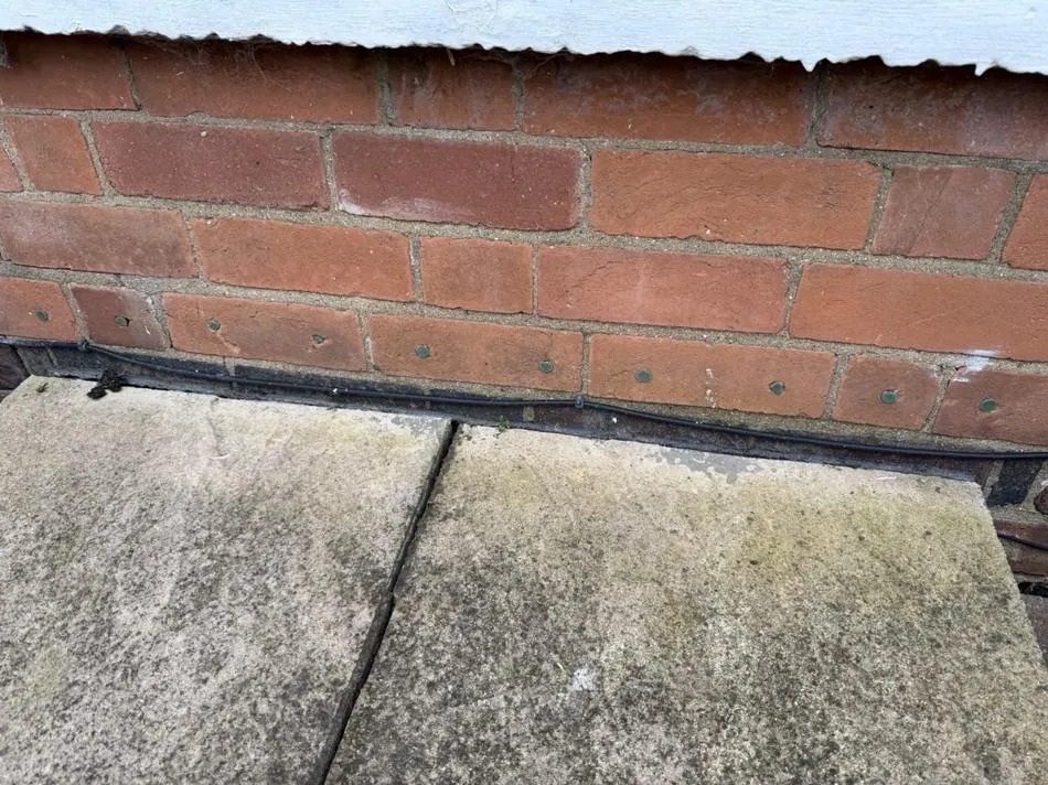Completed wall membrane and floor screed in a structural waterproofing project in Fulham