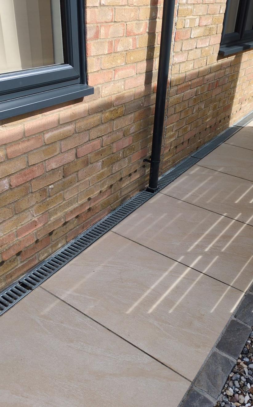 Type C cavity drain membrane detailing to a basement corner in SW6